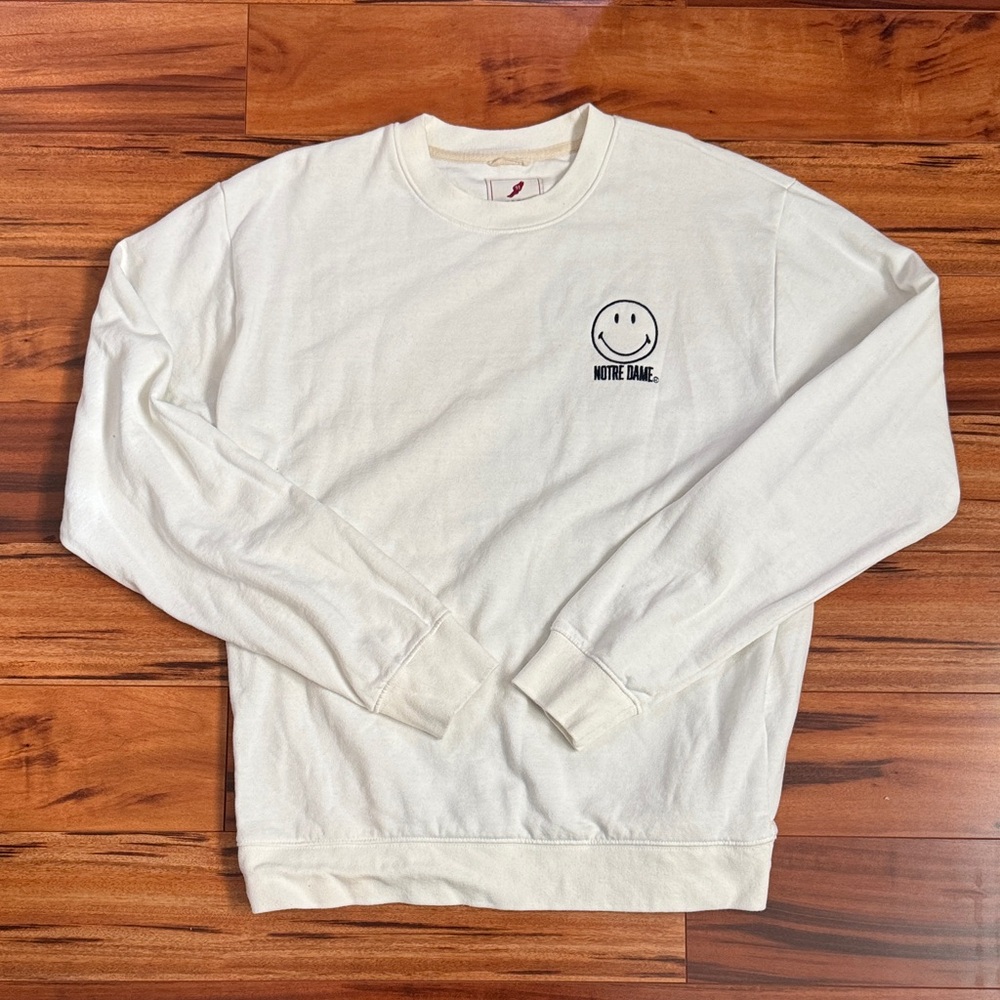 Notre Dame League Cream/white Crewneck Sweater with Smiley Logo